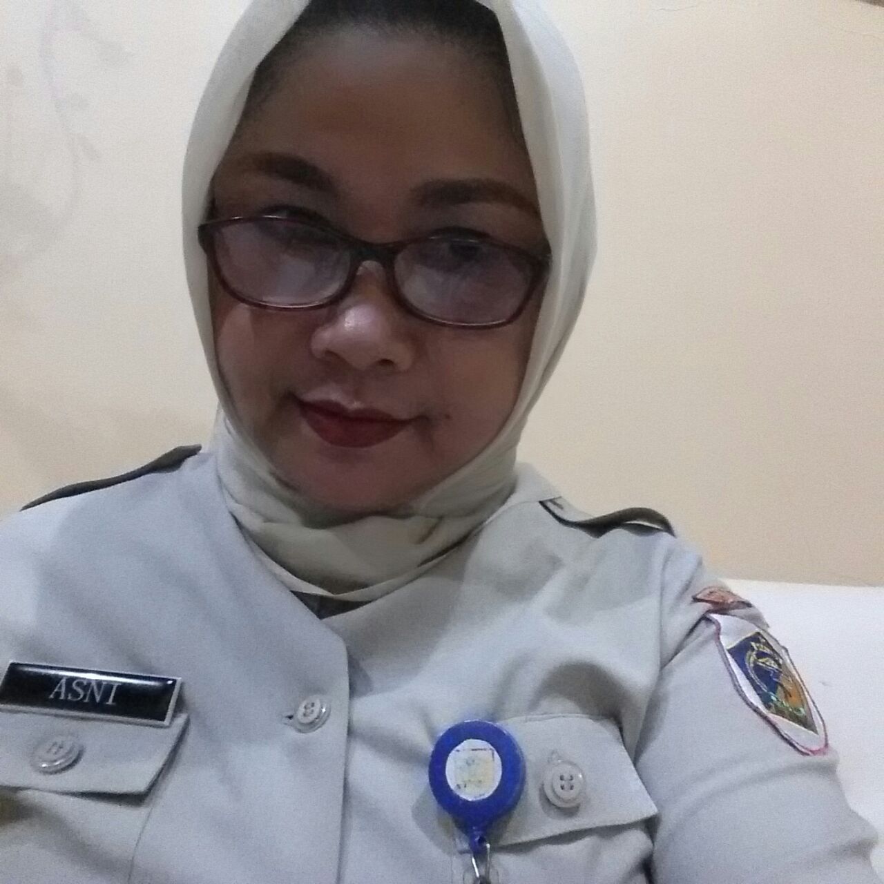 ASNI L.TOMBAAN