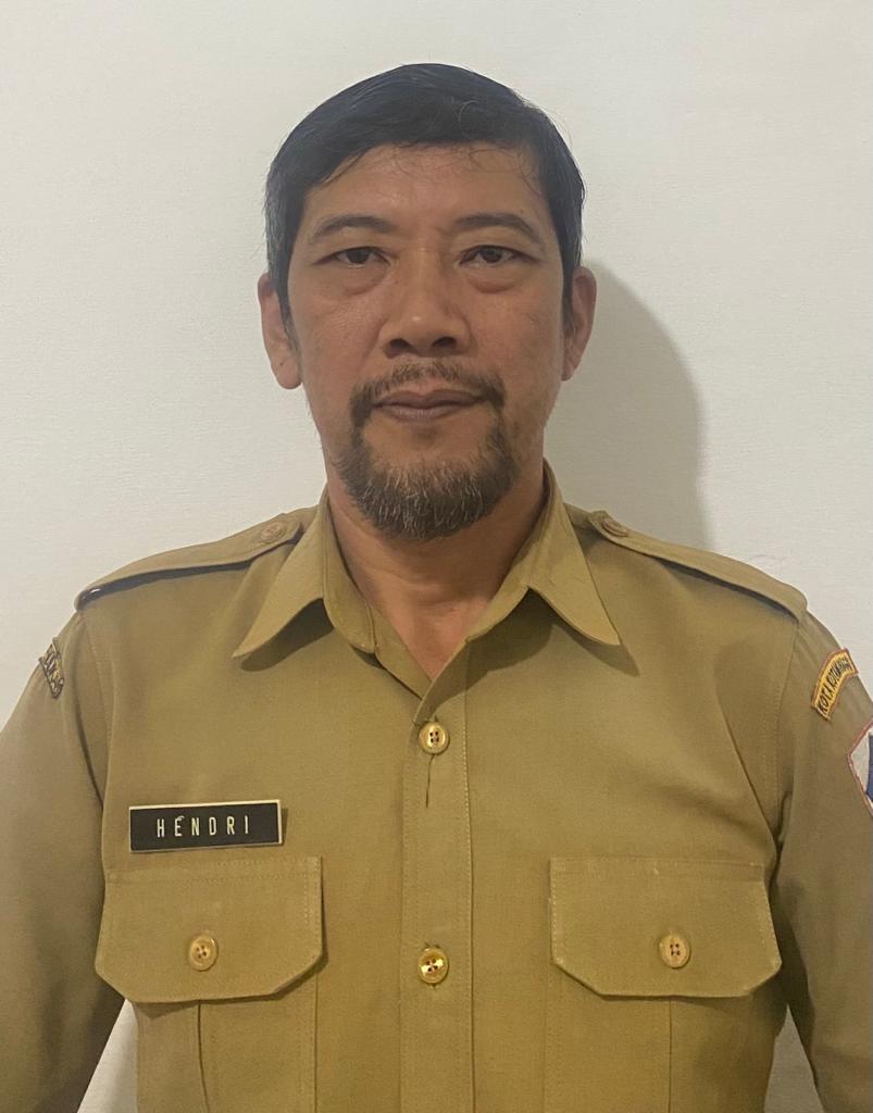 HENDRI RISMAN MOKOGINTA
