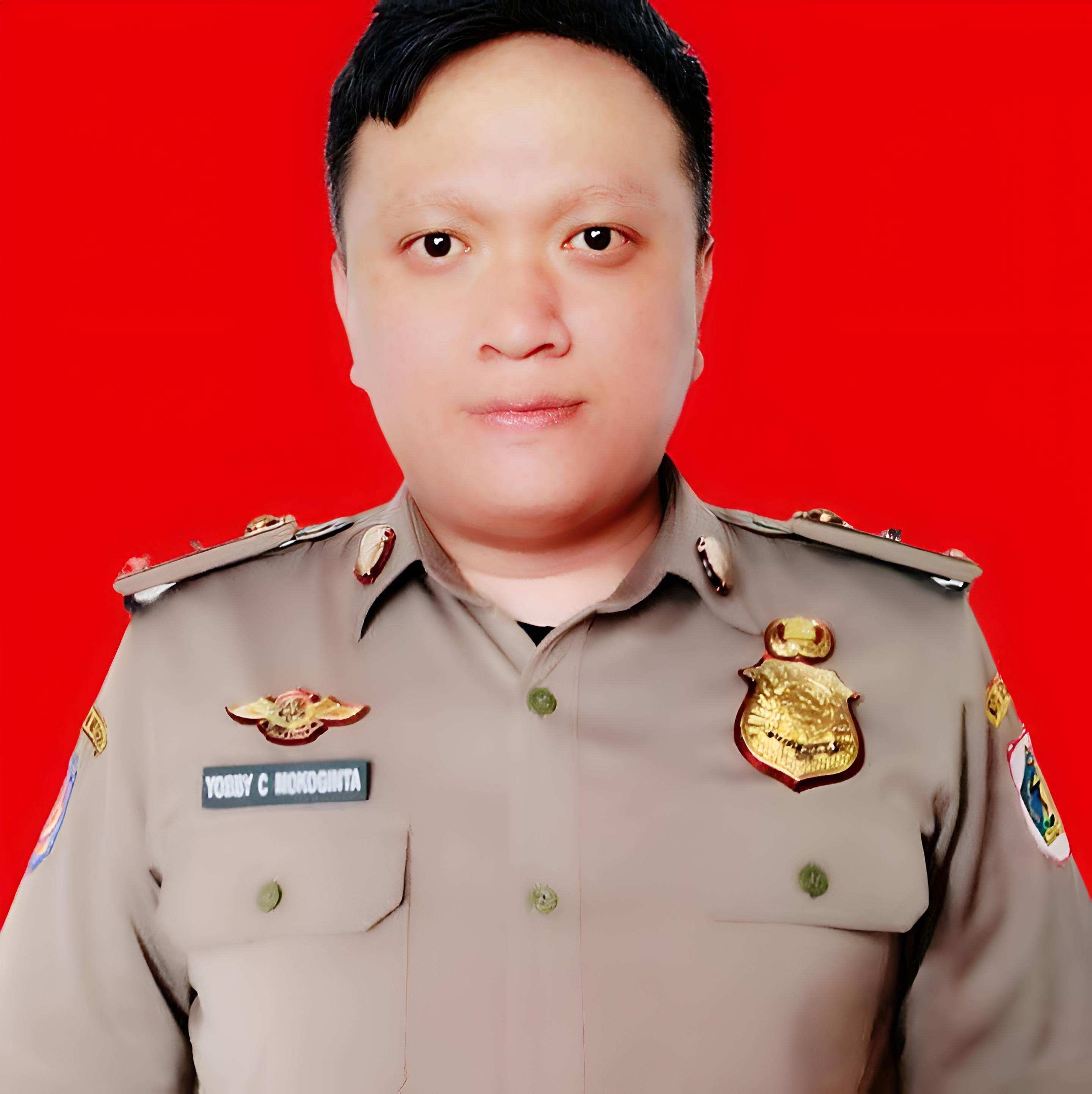 YOBBY CAHYADI MOKOGINTA